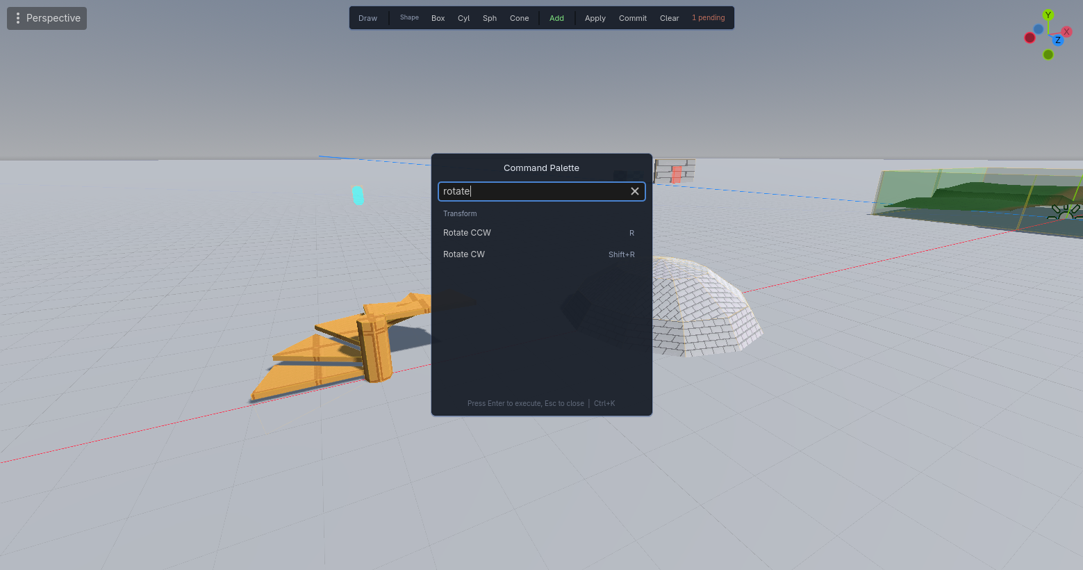 The command palette over the viewport, filtered to the two rotate actions and their keys